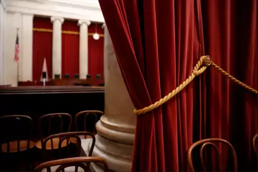 Red velvet drapes hang at the back of the courtroom at the U.S. Supreme Court building in Washington, U.S. June 20, 2016