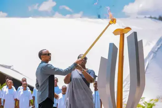 Rwandan President Paul Kagame and first lady Jeannette Kagame light a flame of remembrance at the Kigali Genocide Memorial in Kigali, Rwanda, on April 7, 2023.