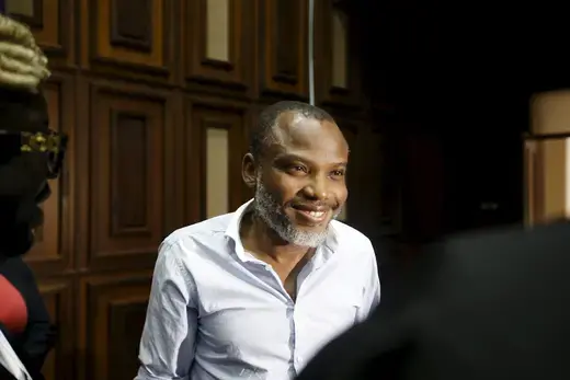 Indigenous People of Biafra (IPOB) leader Nnamdi Kanu is pictured smiling at the Federal High Court in Abuja, Nigeria.