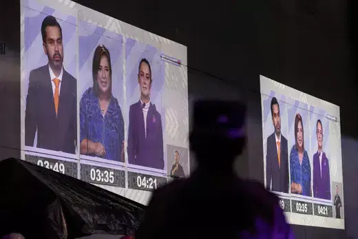 People watch a broadcast of the third Mexican presidential debate, held at the Tlatelolco University Cultural Center, in Mexico City, Mexico, on May 19, 2024.