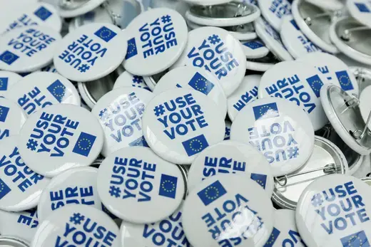 Pin badges encouraging people to vote in June's European Parliament elections are placed at the Malta office information stand during a conference at the European Parliament, in Rabat, Malta May 22, 2024.