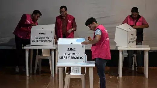 Election staffers prepare voting booths for pretrial detainees ahead of Mexico’s general election, on May 6, 2024.