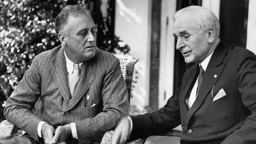 President Franklin Delano Roosevelt speaks with Cordell Hull after Hull's return from the London Economic Conference.