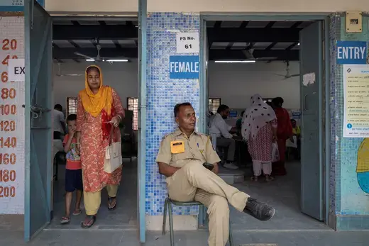 A woman leaves after casting her vote at a polling station during the sixth phase of the general election, in New Delhi, India, May 25, 2024. 