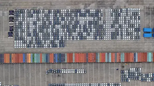 New energy vehicles are being loaded into containers for export at Taicang Port and Taicang International Terminal in Suzhou, Jiangsu Province, China, on April 26, 2024.