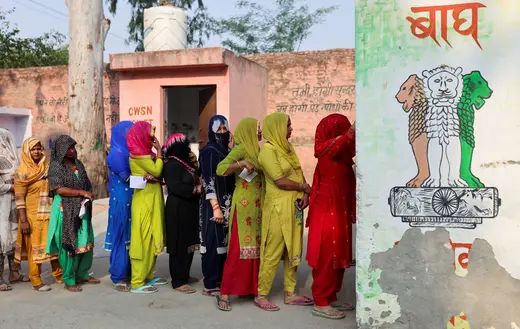 Women line up to cast their votes outside a polling station during the sixth phase of the general election in Sonipat, in the northern Indian state of Haryana, India, May 25, 2024. 