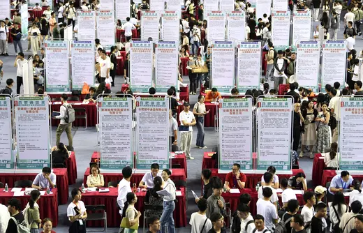 People attend a job fair for university graduates at a gymnasium in Hefei, Anhui province, China September 4, 2023.