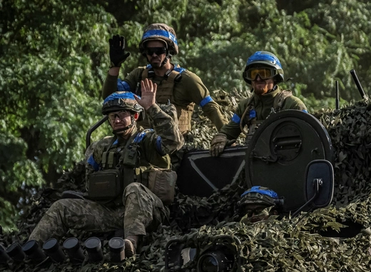 Ukrainian service members ride an armored personnel carrier in the Sumy region of Ukraine, on August 11, 2024. Viacheslav Ratynskyi/File Photo/Reuters