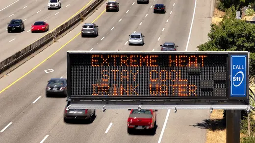  In an aerial view, a Caltrans changeable message sign on Highway 101 displays a warning about extreme heat on July 02, 2024 in Corte Madera, California.