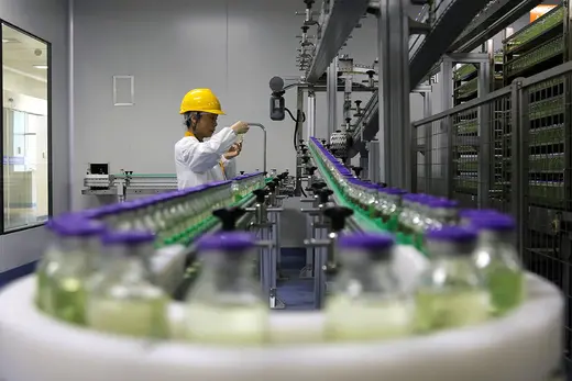 An employee works on a production line manufacturing drugs at the Yangtze River Pharmaceutical Group in Taizhou, Jiangsu province, China September 3, 2019