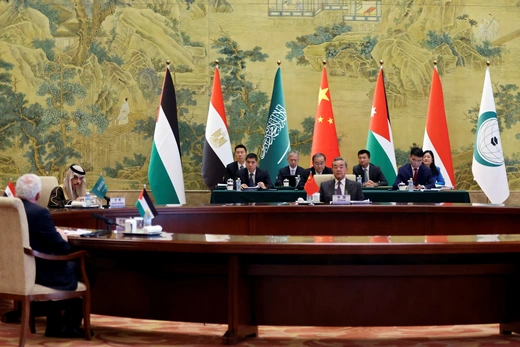 Chinese Foreign Minister Wang Yi, Saudi Foreign Minister Prince Faisal bin Farhan Al Saud and Palestinian Foreign Minister Riyad Al-Maliki attend a meeting with Jordanian, Egyptian, Indonesian and Organisation of Islamic Cooperation (OIC) delegations.REUTERS/Florence Lo/Pool