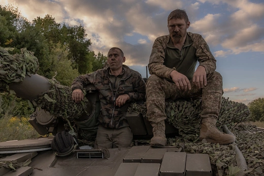 Ukrainian tank crew take a break while operating a Soviet-made T-72 tank near the Russian border in Sumy Oblast, Ukraine, on August 12, 2024. Roman Pilipey/AFP/Getty Images