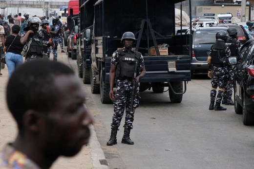 Nigerian police personnel restrict protesters from convening for the sixth day of anti-government demonstrations against bad governance and economic hardship in Lagos, Nigeria on August 6, 2024.