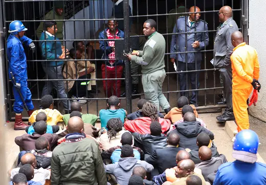 Activists from the opposition party Citizens Coalition for Change (CCC) arrested for holding a political gathering which authorities said was unauthorized arrive at the Magistrates' courts in Harare, Zimbabwe on June 18, 2024.