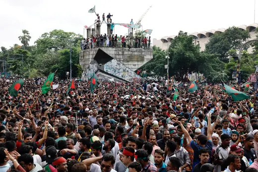 People celebrate the resignation of Bangladeshi Prime Minister Sheikh Hasina in Dhaka, Bangladesh, August 5, 2024. Mohammad Ponir Hossain/Reuters