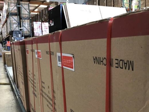 Boxes marked 'Made in China' are lined up in NewAir's warehouse in Cypress, CA.