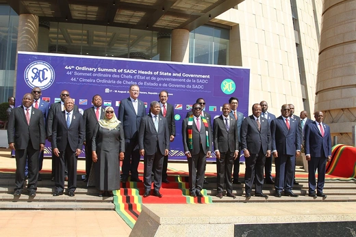 Participants pose for a group photo at a summit of SADC Heads of State and Government in Harare, Zimbabwe, on Aug. 17, 2024.