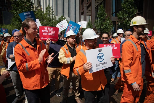 US Steel Corporation workers rally outside the company's headquarters in Pittsburgh, Pennsylvania, supporting the takeover by Japan's Nippon Steel, on September 4, 2024. United States Steel warned Wednesday it could shut its Pittsburgh headquarters and shutter long-running factories in Pennsylvania if the politically sensitive takeover by Nippon is blocked.