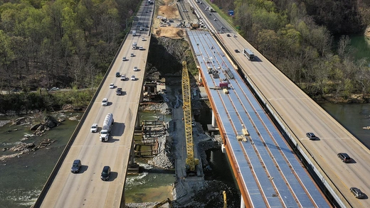 FREDERICKSBURG, VA - APRIL 6: In an aerial view, vehicles on Interstate 95 travel past a construction project to add three lanes to the I-95 Rappahannock River Crossing on April 6, 2021 in Fredericksburg, Virginia.