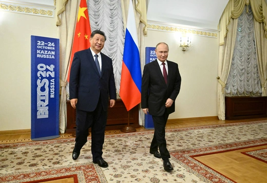 Russian President Vladimir Putin and Chinese President Xi Jinping walk during a meeting on the sidelines of the BRICS Summit in Kazan, Russia October 22, 2024. Kristina Kormilitsyna/BRICS-RUSSIA2024.RU Host Photo Agency via REUTERS