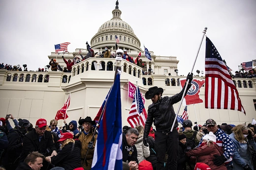 Pro-Trump supporters storm the U.S. Capitol following a rally with President Donald Trump on January 6, 2021 in Washington, DC. Trump supporters gathered in the nation's capital today to protest the ratification of President-elect Joe Biden's Electoral College victory over President Trump in the 2020 election. (Photo by Samuel Corum/Getty Images)