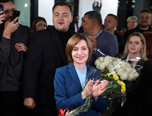 Moldova's incumbent President and presidential candidate Maia Sandu celebrates with supporters following the announcement of the preliminary results of the second round of the presidential election, at her campaign headquarters in Chisinau, Moldova November 3, 2024. 