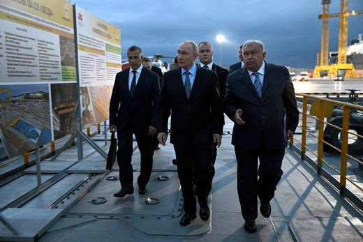 Russian President Vladimir Putin accompanies Chief Executive Igor Sechin of the Rosneft oil company and Deputy Prime Minister Yuri Trutnev to the Zvezda shipyard near Vladivostok, Russia. Pavel Bednyakov/Sputnik via Reuters.