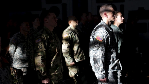 U.S. military personnel stand at the U.S. Military Academy at West Point.