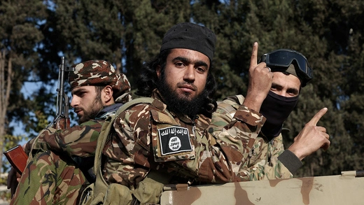 Rebel fighters ride in a vehicle after they seized Damascus and ousted President Bashar in Syria, December 9, 2024.