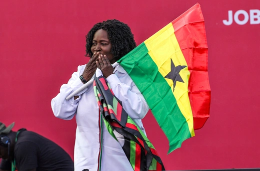 Jane Naana Opoku-Agyemang, 73, running mate of Ghana's main opposition National Democratic Congress (NDC) party presidential candidate John Dramani Mahama, blows a kiss to supporters during the final election campaign rally in Accra, Ghana December 2024.