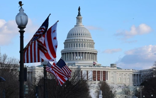 U.S. Capitol with flags