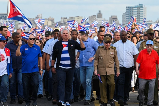 Cuban President Miguel Díaz-Canel and former President Raúl Castro participate in a march protesting the U.S. blockade against the island, in Havana, Cuba.