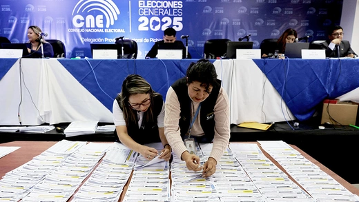 Election clerks go through the re-tallying of votes for Ecuador’s presidential and parliamentary elections, in Quito, Ecuador.