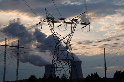 Power lines are seen in front of cooling towers at the nuclear-powered Vogtle Electric Generating Plant in Waynesboro, Georgia, U.S.