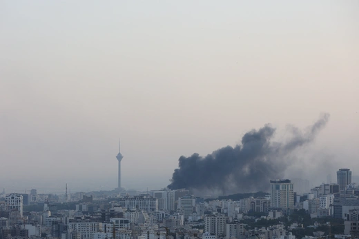 Smoke rises after an Israeli air strike on the Tehran building housing Iran’s state broadcaster on June 16, 2025.