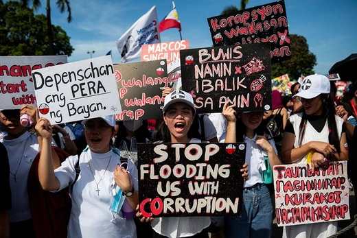 Image of Filipinos gather during a protest denouncing what they call corruption linked to flood control projects.