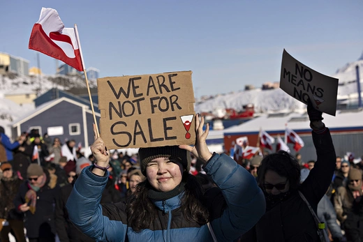 Image of protesters in Greenland demonstrating in from of the U.S. Consulate in Nuuk, Greenland.
