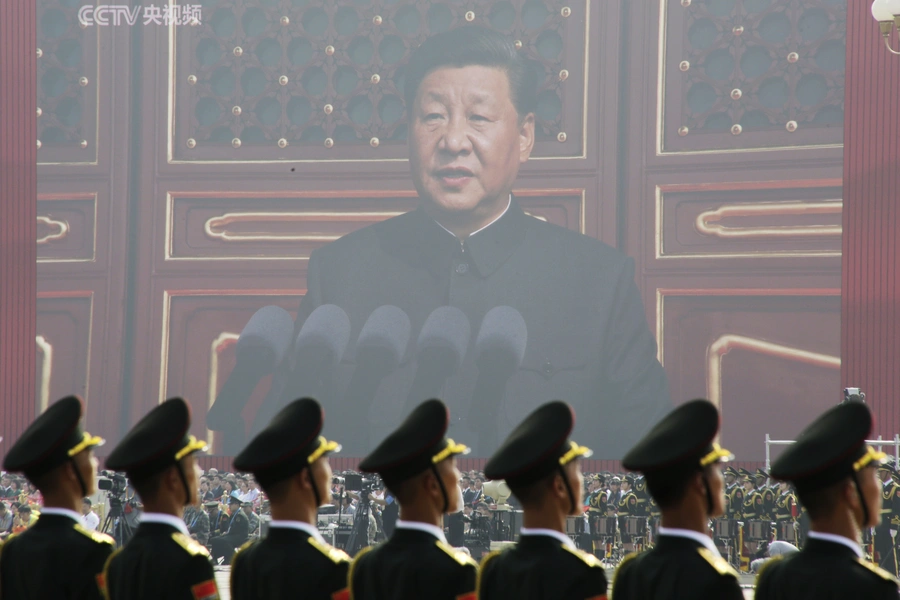 Soldiers of People’s Liberation Army (PLA) are seen before a giant screen as Chinese President Xi Jinping speaks at the military parade marking the 70th founding anniversary of People’s Republic of China. Jason Lee/Reuters