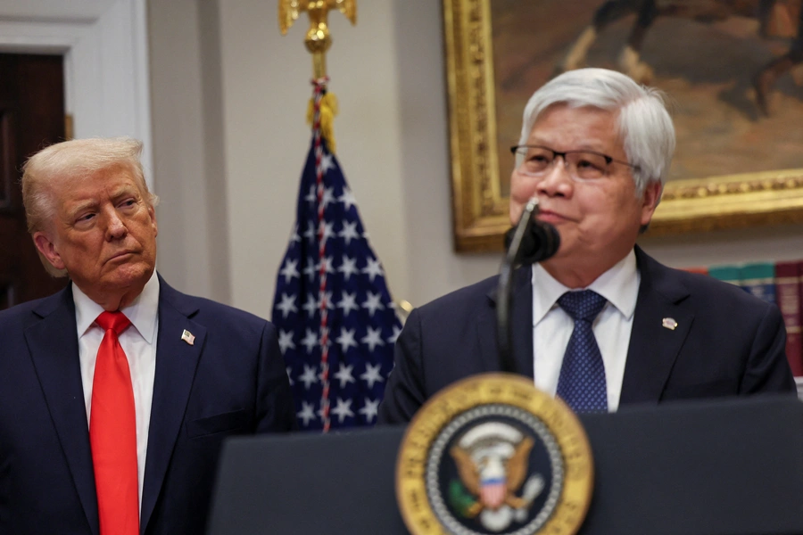 U.S. President Donald Trump listens to C.C. Wei, Chairman and CEO of TSMC, as they make an announcement about an investment from Taiwan Semiconductor Manufacturing Company (TSMC), in the Roosevelt Room at the White House in Washington, D.C., U.S., March 3, 2025. REUTERS/Leah Millis