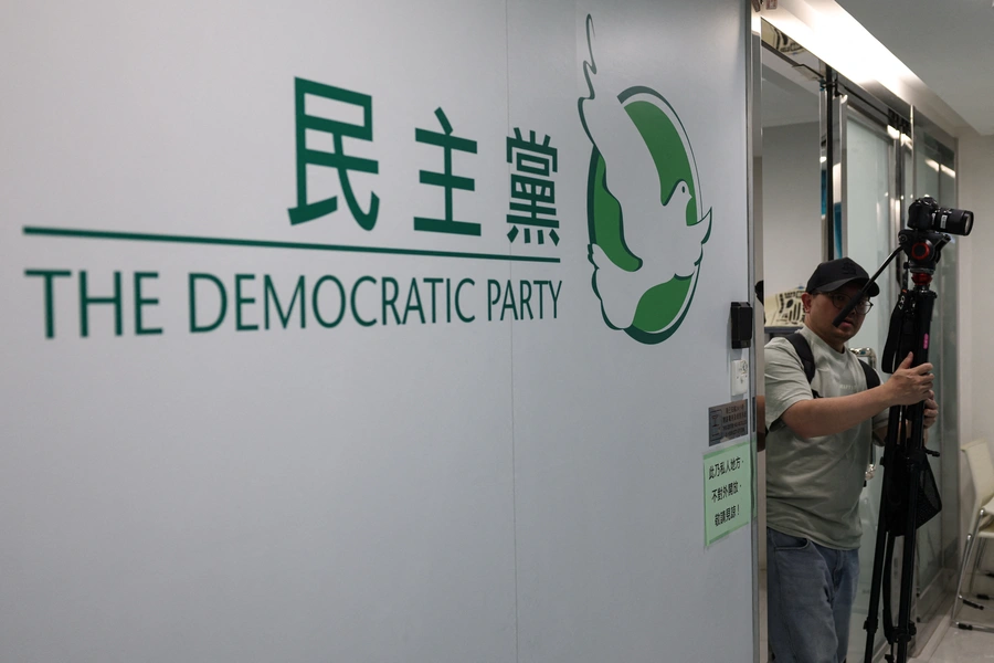 The logo of the Democratic Party is seen at its office, in Hong Kong, China, April 13, 2025. REUTERS/Tyrone Siu