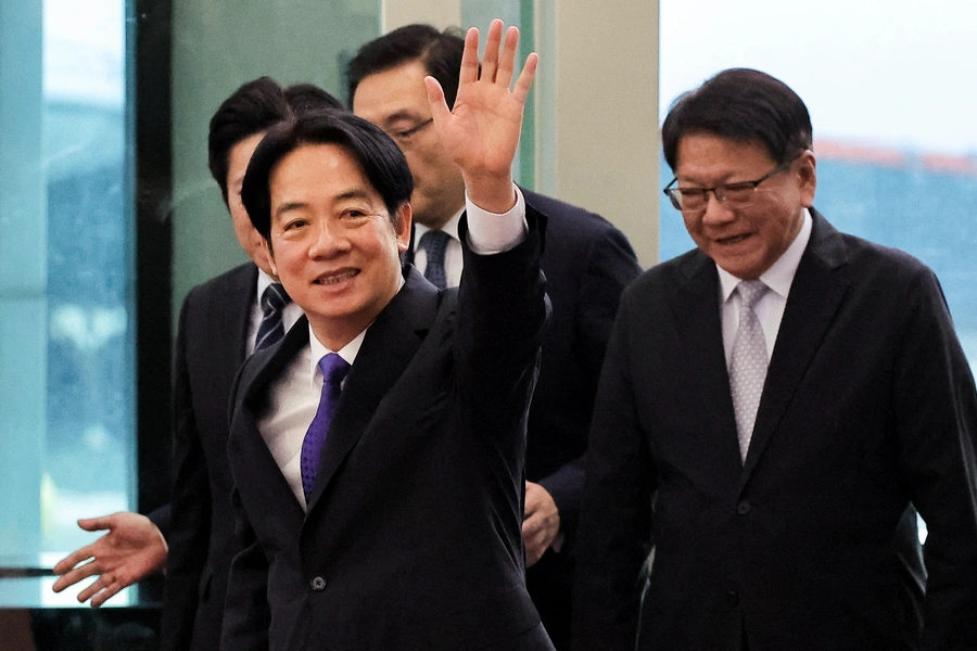 Taiwan President Lai Ching-te waves as he leaves for a trip to Hawaii, Guam and the Pacific Island allies at the airport in Taoyuan, Taiwan November 30, 2024. REUTERS/Ann Wang
