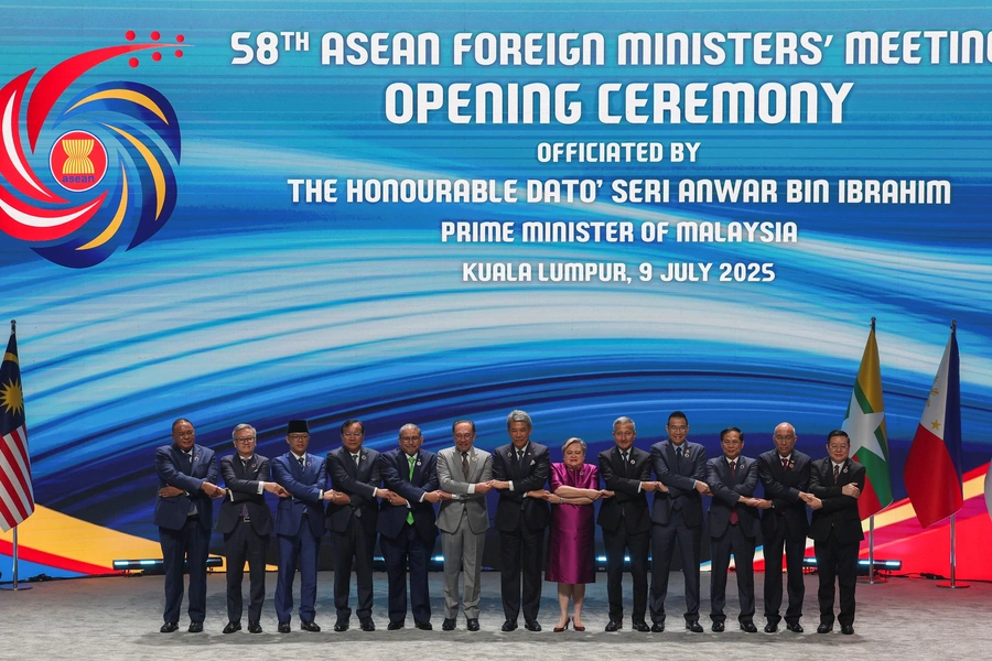 ASEAN foreign ministers join hands for a group photo during the opening ceremony of the 58th ASEAN Foreign Ministers' Meeting (AMM) in Kuala Lumpur, Malaysia, on July 9, 2025. Hasnoor Hussain/Reuters