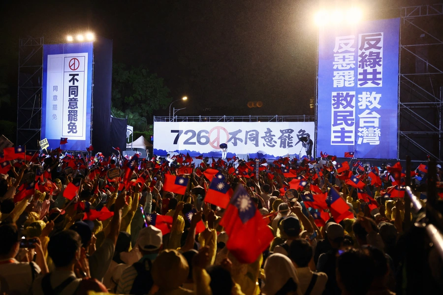 Supporters of Kuomintang (KMT) party attend a rally against the recall campaign ahead of Saturday's vote for lawmakers, in Taipei, Taiwan July 25, 2025. REUTERS/Annabelle Chih