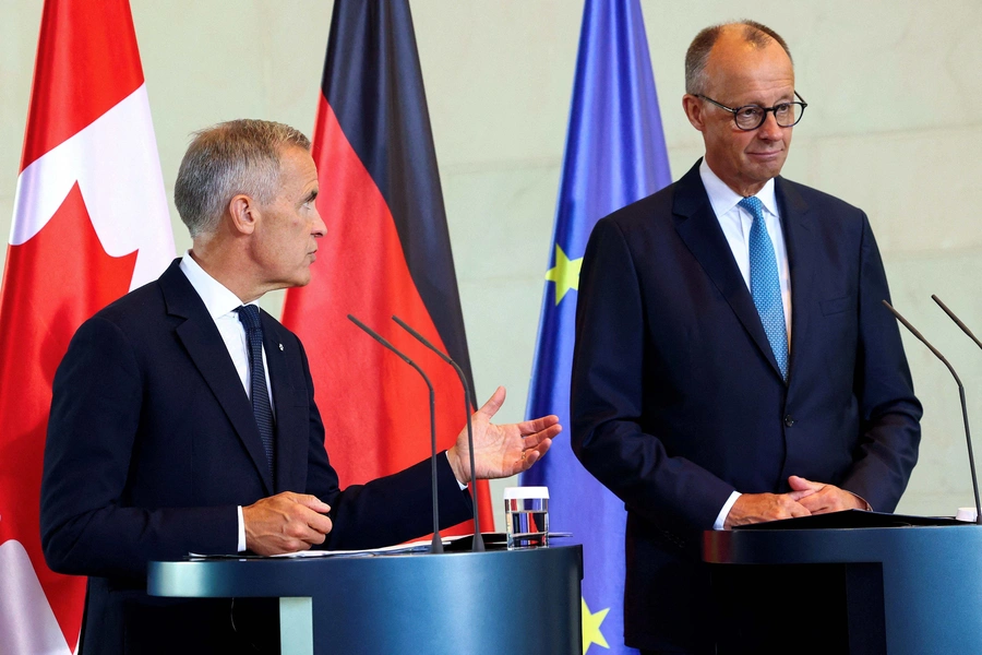 German Chancellor Friedrich Merz and Canadian Prime Minister Mark Carney hold a press conference at the Chancellery in Berlin, Germany August 26, 2025. REUTERS/Christian Mang