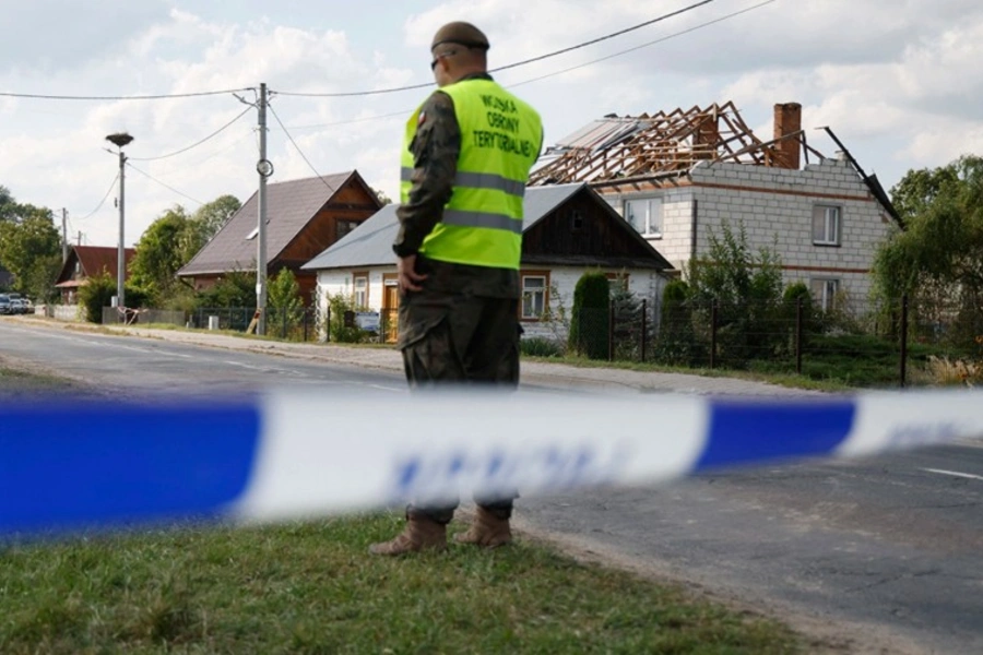Police and army inspect damage to a house destroyed by debris from a shot down Russian drone in the village of Wyryki-Wola, eastern Poland, September 10, 2025. Wojtek Radwanski/AFP/Getty Images