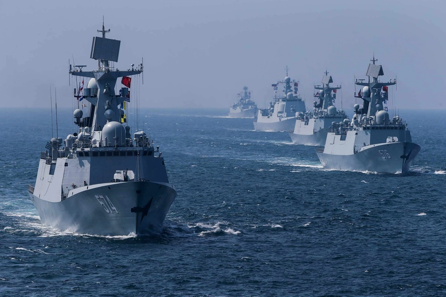 A fleet of ships sail out at sea as China and Russia's naval joint drill concludes in Zhanjiang, Guangdong Province, China. Stringer/Reuters