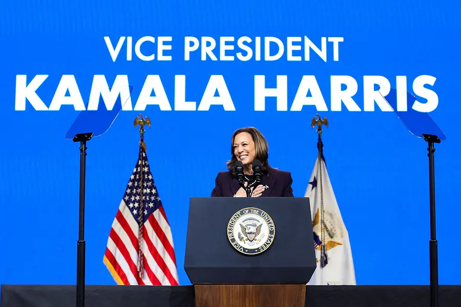 Vice President Kamala Harris speaks at a lecturn.