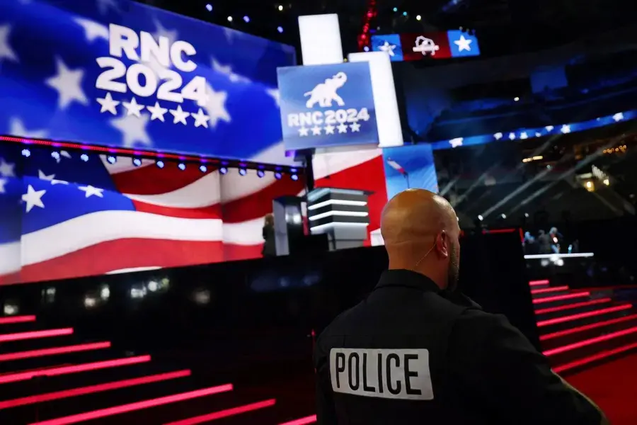 A police officer stands in front of the stage at the 2024 Republican National Convention.