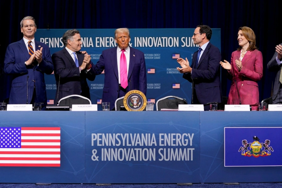 Chairman and CEO of BlackRock Larry Fink, U.S. Treasury Secretary Scott Bessent, Senator Dave McCormick (R-PA), Chief Operating Officer of Blackstone Jon Gray, Alphabet & Google President and Chief Investment Officer Ruth Porat and CEO of Exxon Mobil Corp REUTERS/Nathan Howard
