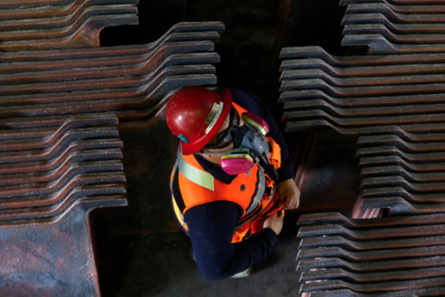A miner stands among copper production at El Teniente mine, the world’s largest underground copper mine in Machali, near Rancagua, Chile, on April 2. Raul Bravo/AFP/Getty Images